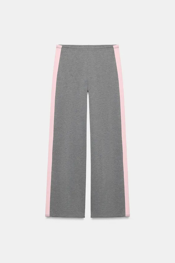 Trousers made from a cotton blend. Mid-waist with an elasticated waistband. Featuring contrast si... | Zara UK