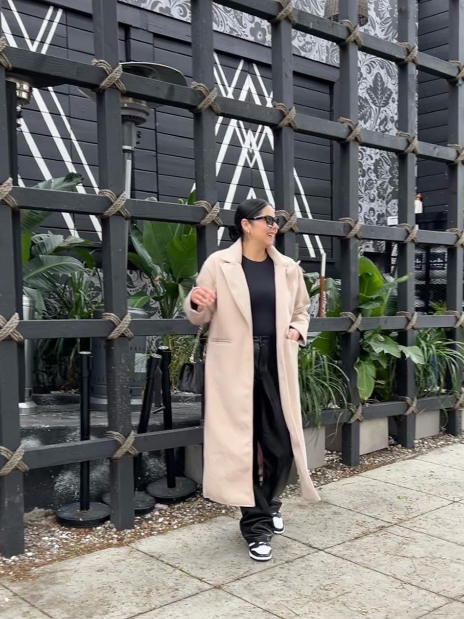 Long coat with faux leather pants, casual stylish outfit with black and white dunks 

#LTKootd #LTKMidsize #LTKOver40