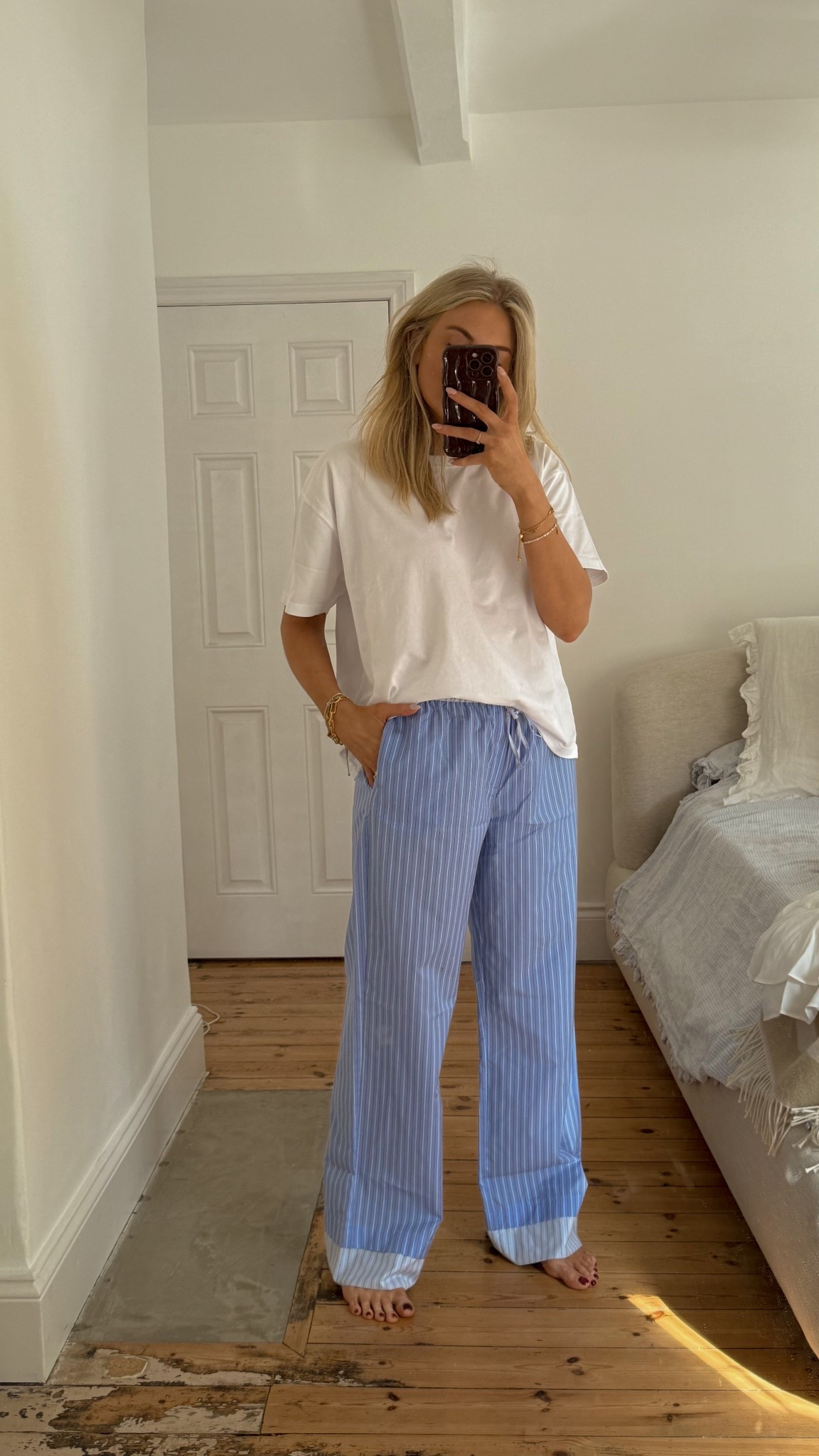 Spring outfit! Holiday style! Zara blue stripe loose trousers, summer trousers, spring trousers and American vintage white t shirt , white tee 

#LTKsummer #LTKspring #LTKuk
