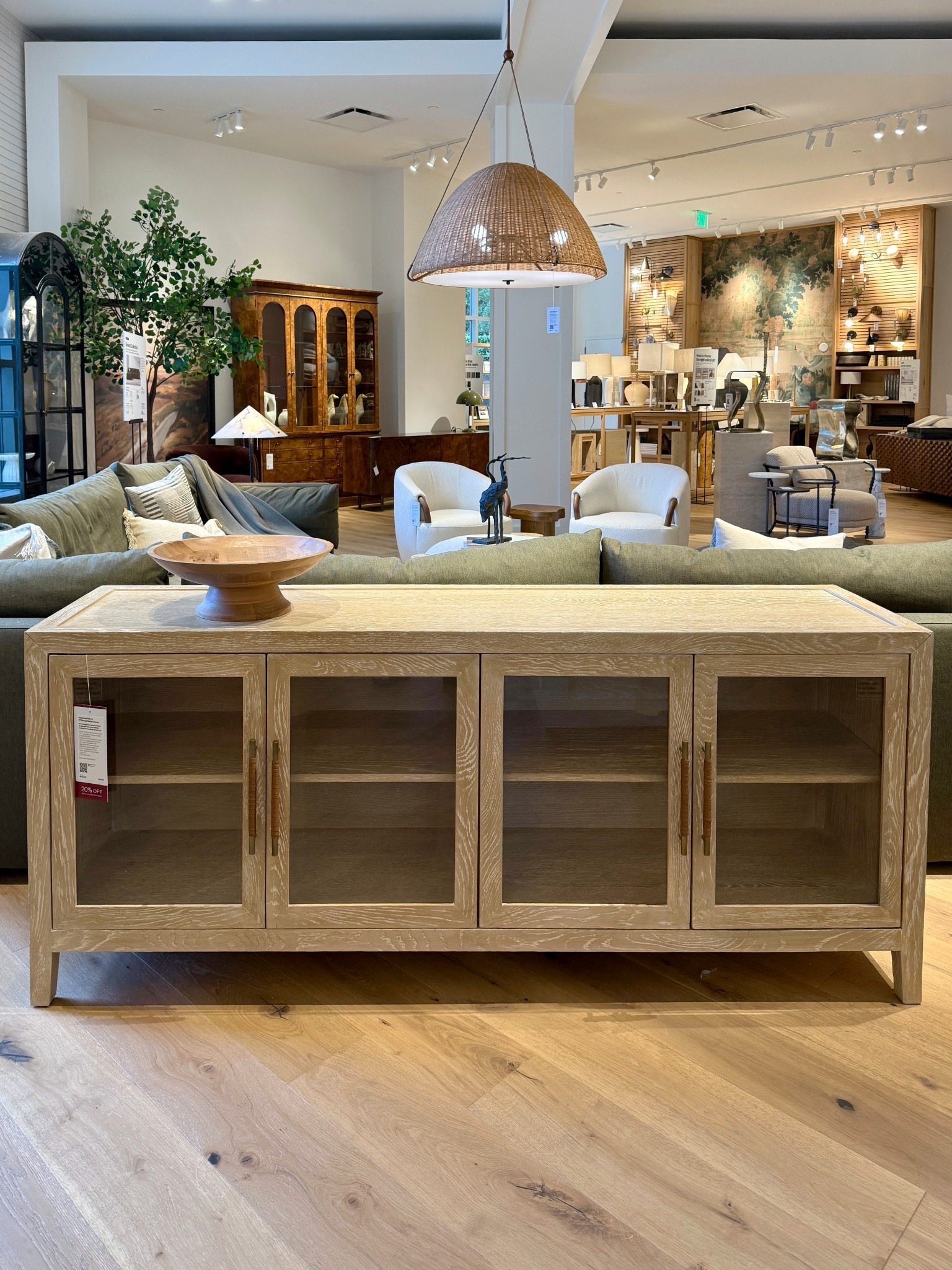Meet the Clairemont Natural Wood Storage Media Console — a gorgeous blend of modern lines and timeless craftsmanship. ✨ Made from FSC-certified oak and finished in a driftwood tone with ivory cerusing, this piece showcases beautiful natural grain, glass-front cabinets, and brass leather-wrapped pulls that elevate any space. 💫 Perfect as a sideboard, media console, or credenza, it offers tons of storage with adjustable shelves and smart cord-management. A stunning neutral foundation that works with any style. 🤎 #CrateAndBarrel #NeutralDecor #HomeInspo

#LTKSaleAlert #LTKHome