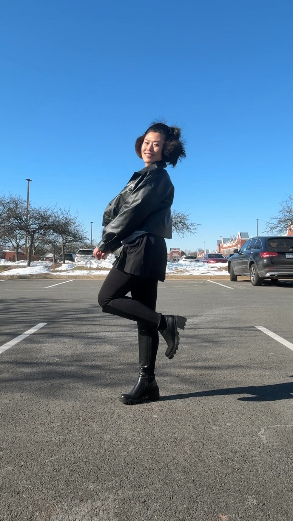 messy windy hair don’t care...Winter outfit style, leather jacket, cropped leather jacket, black mini skirt/skort, knee high boots, fleece lined leggings  

#LTKstyletip #LTKSeasonal #LTKVideo