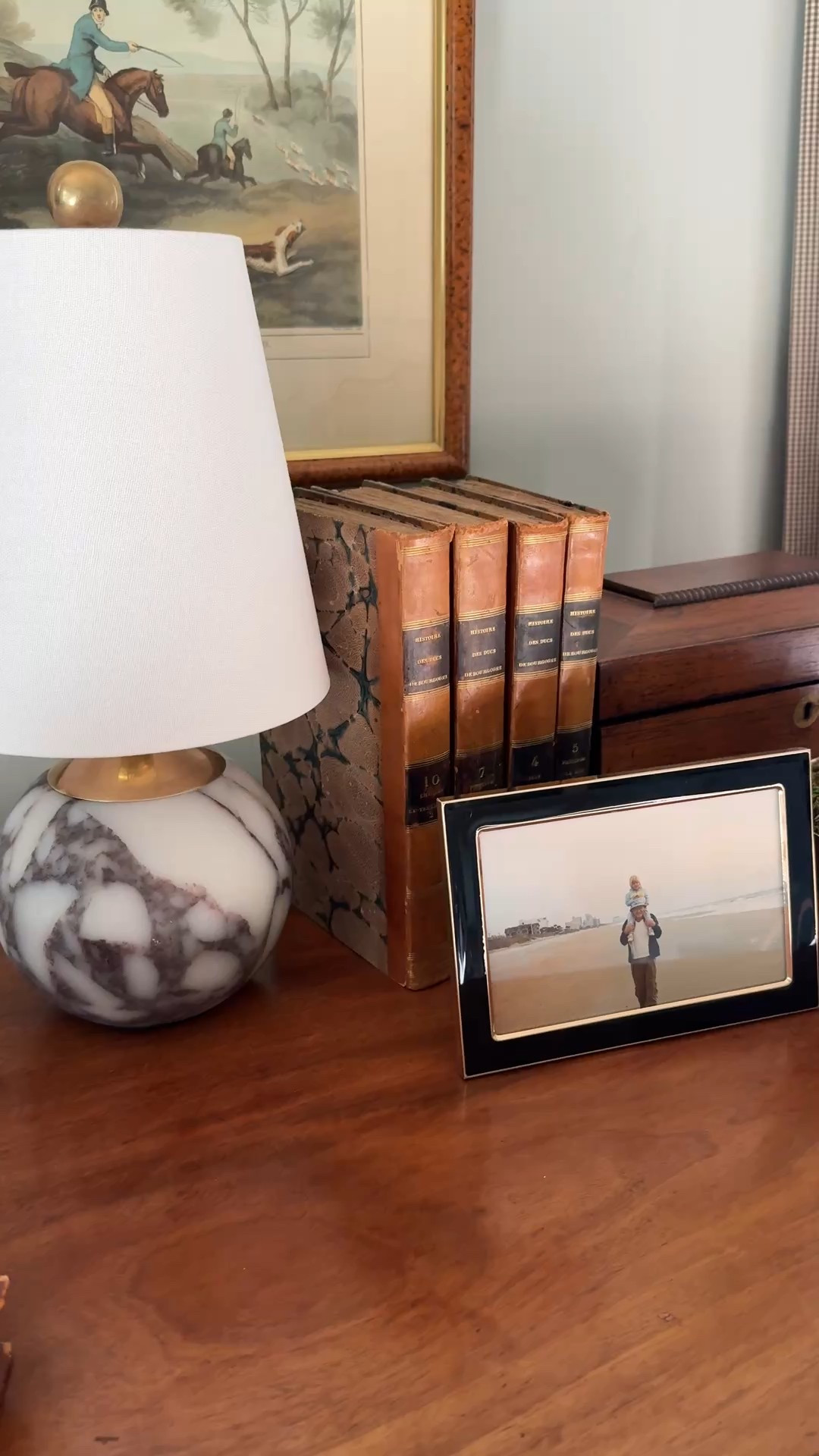 Pretty little lamp mixing touches of elegance with heritage furniture, books, boxes and special photographs make it feel like home 🤍

#LTKHome