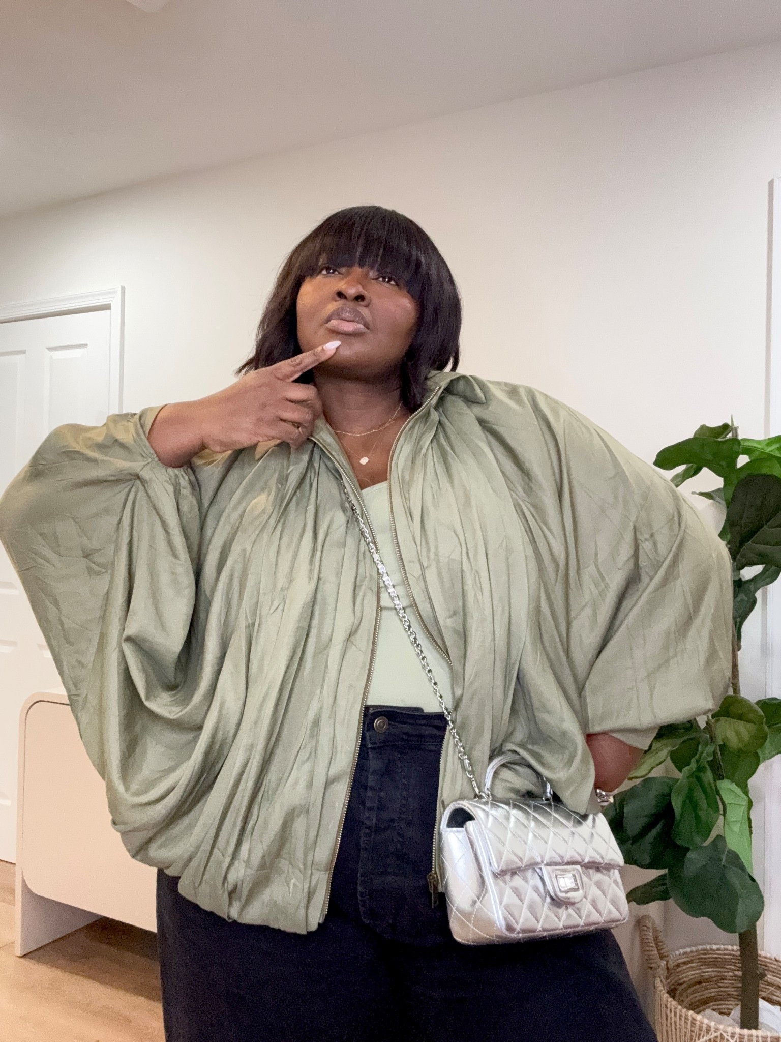 This oversized puffed bomber jacket is the perfect statement piece to elevate your everyday outfits. Paired with a chic quilted crossbody bag, this look instantly upgrades simple basics into a polished, put-together outfit with minimal effort. #LTKstyle #StatementJacket #AmazonFashionFinds #EffortlessStyle #EverydayOutfits #StreetStyle #CurvyFashion #LayeredLook #OOTDStyle #AffordableFashion

#LTKSeasonal #LTKootd #LTKFestival