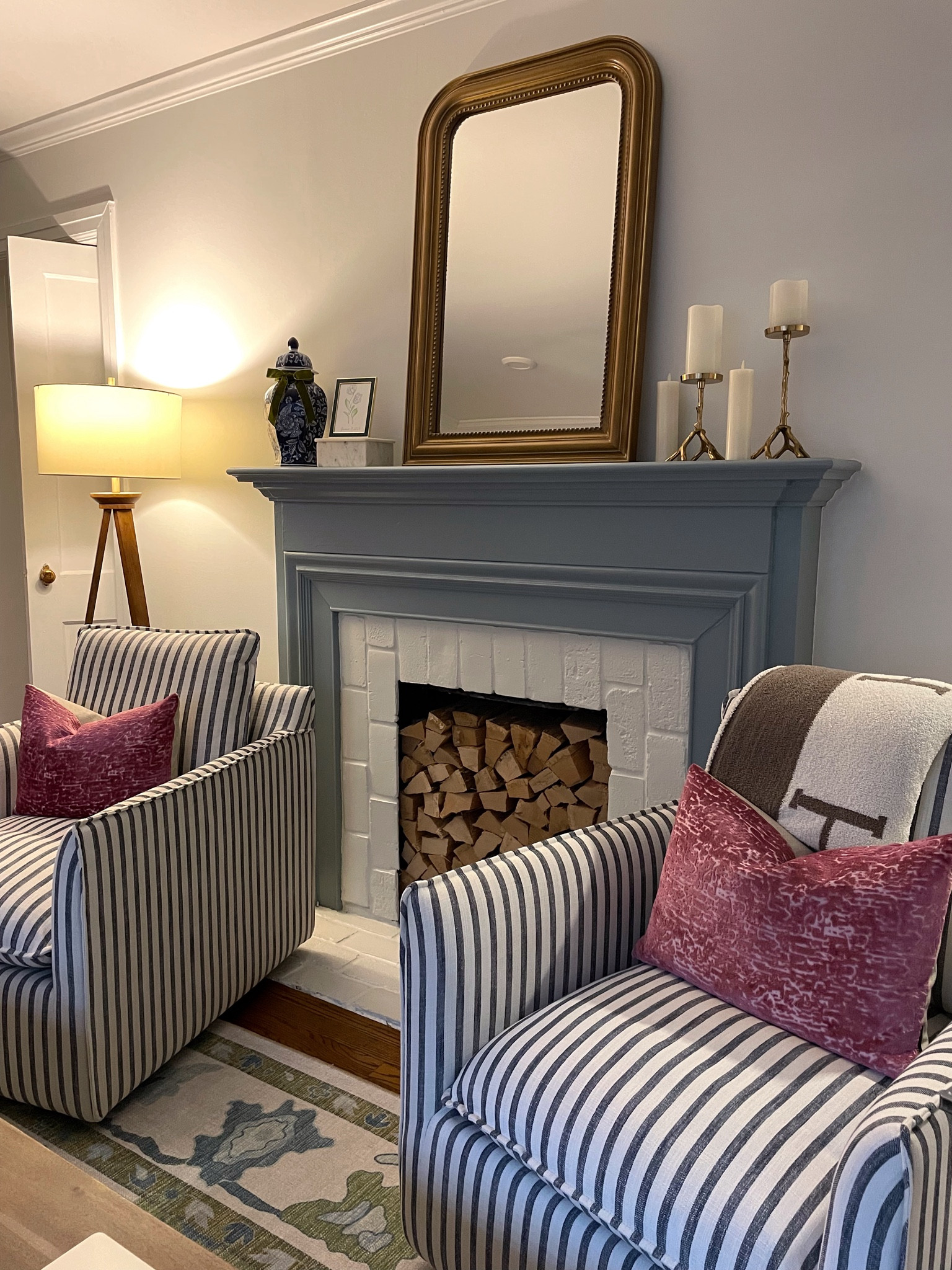 New stripe swivel accent chairs for the living room!! Great Wayfair find. Also painted our mantel blue and upgraded the mirror — yay!! Throw pillows were a home goods find, but I linked similar!

#LTKFamily #LTKHome #LTKSaleAlert