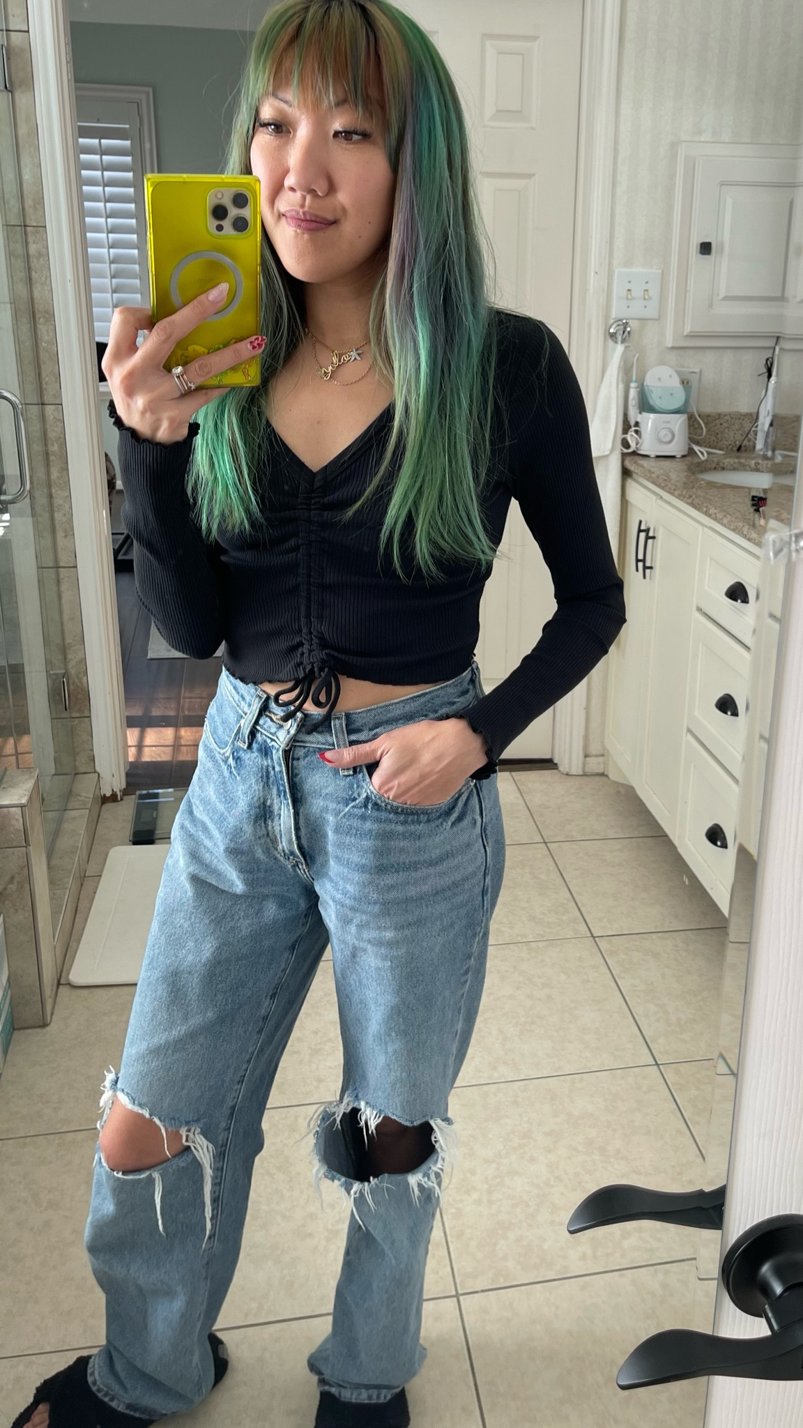 Delia’s catalog vibes anyone? I feel like this is the wardrobe I wish I had in middle/ high school! I remember being young, wanting everything, and not having the money for it. Now that I am older, I am pleased to find that this entire outfit is super affordable! These are my favorite comfy baggy jeans, I find myself wearing them around the house or anywhere really. The top is rushed and you can adjust the tie. The texture is ribbed and the edges of the material are scalloped. It is just perfect for comfy, casual chilling at home or going out for a coffee date.

Now that I am older, I also have the fun hair color that I always wish I could have achieved as a teenager lol 

Now I just make sure that I use semi permanent hair color that is gentle on my hair and gives me the bright vivid hair colors that I want to wear for spring! 

Clear Square neon jelly phone case also linked. 

#LTKsalealert #LTKstyletip #LTKfindsunder50