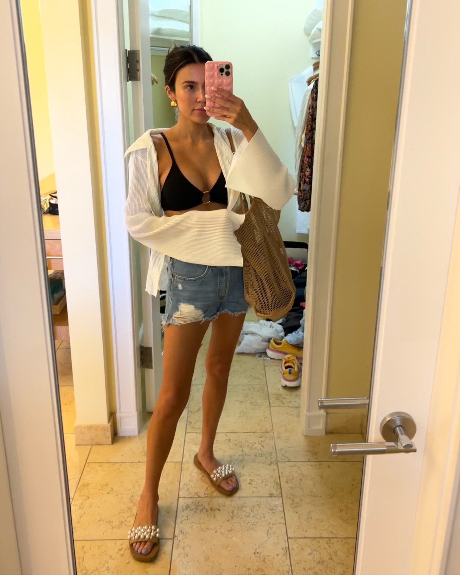 Beach day outfit of the day 🌊☀️ these jean shorts are a summer staple that I’ve had for years & this beach bag is the best ever!

Sizing:
Swimsuit- M
White button up- M
Denim shorts- 26

Resort wear; travel outfit; beach outfit; black bikini; distressed denim shorts; white coverup; mesh beach bag; Stuart Weitzman; Amazon fashion

#LTKstyletip #LTKtravel #LTKunder50