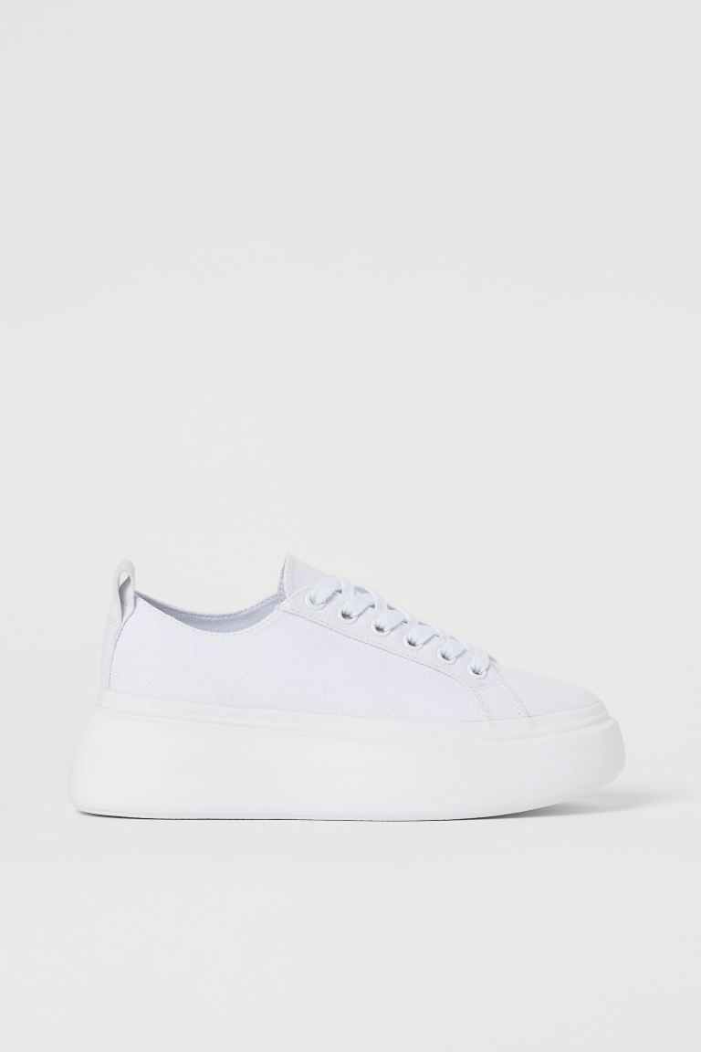 Low-profile platform sneakers in cotton canvas with lacing at top and wide loop at back. Cotton l... | H&M (US + CA)