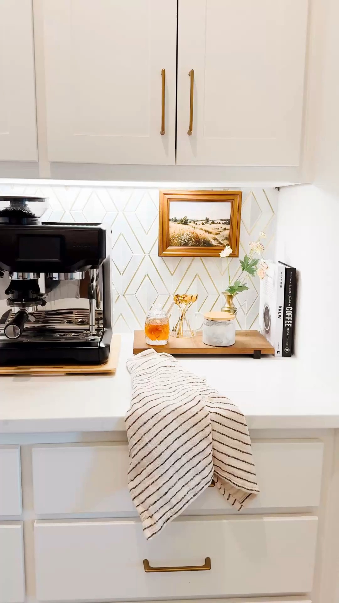 Cozy coffee bar setup that makes mornings feel elevated ☕️ sharing my espresso machine, favorite accessories, and simple styling details that make this space feel warm, functional, and pulled together. Perfect neutral kitchen coffee station idea with brass accents, marble touches, and everyday essentials you’ll actually use. Follow me on LTK for daily home decor, Amazon finds, and elevated everyday styling.

#LTKHome #LTKSaleAlert