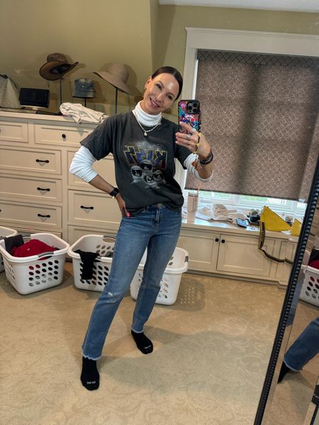 I love wearing a T-shirt and turtleneck with jeans. It adds a little extra fun to your outfit while still staying warm in the cool spring air. Wearing size small in turtleneck and tshirt. Size 25 in jeans. 

#LTKstyletip #LTKSeasonal #LTKparties
