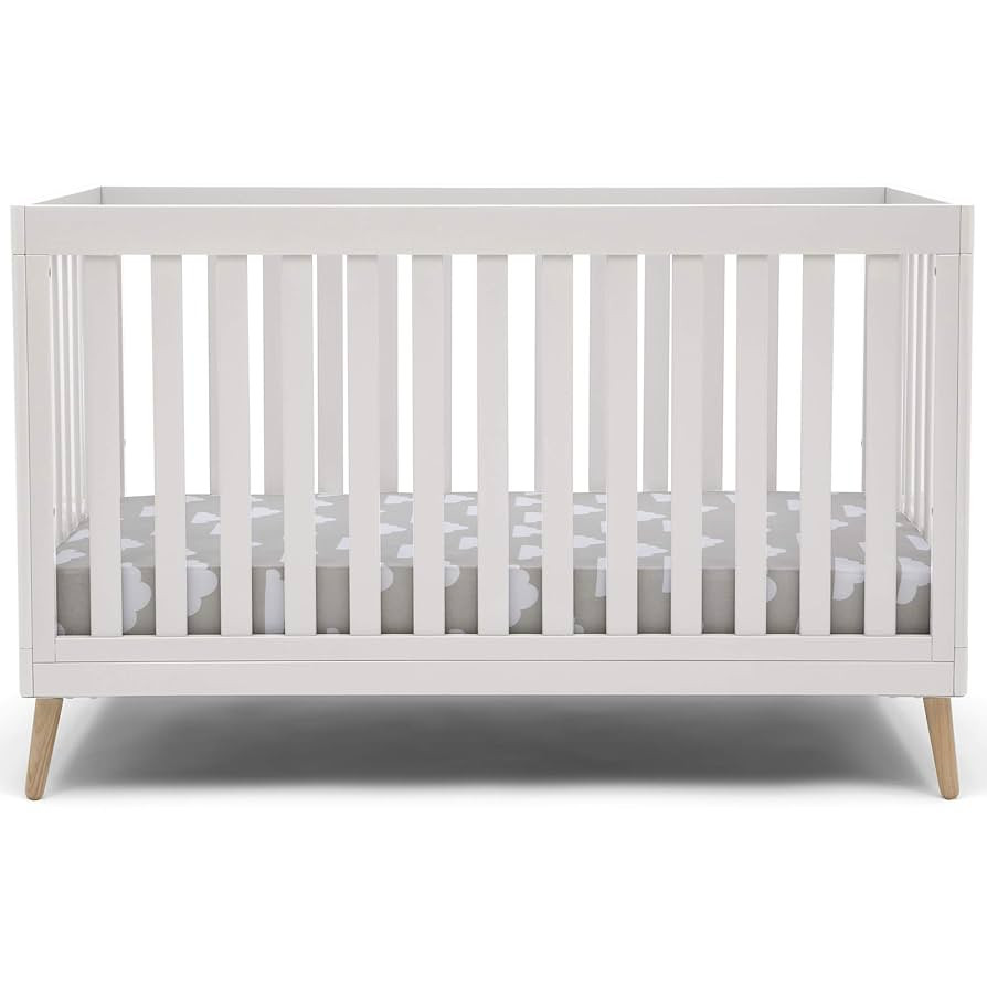 Delta Children Essex 4-in-1 Convertible Baby Crib, Bianca White with Natural Legs | Amazon (US)