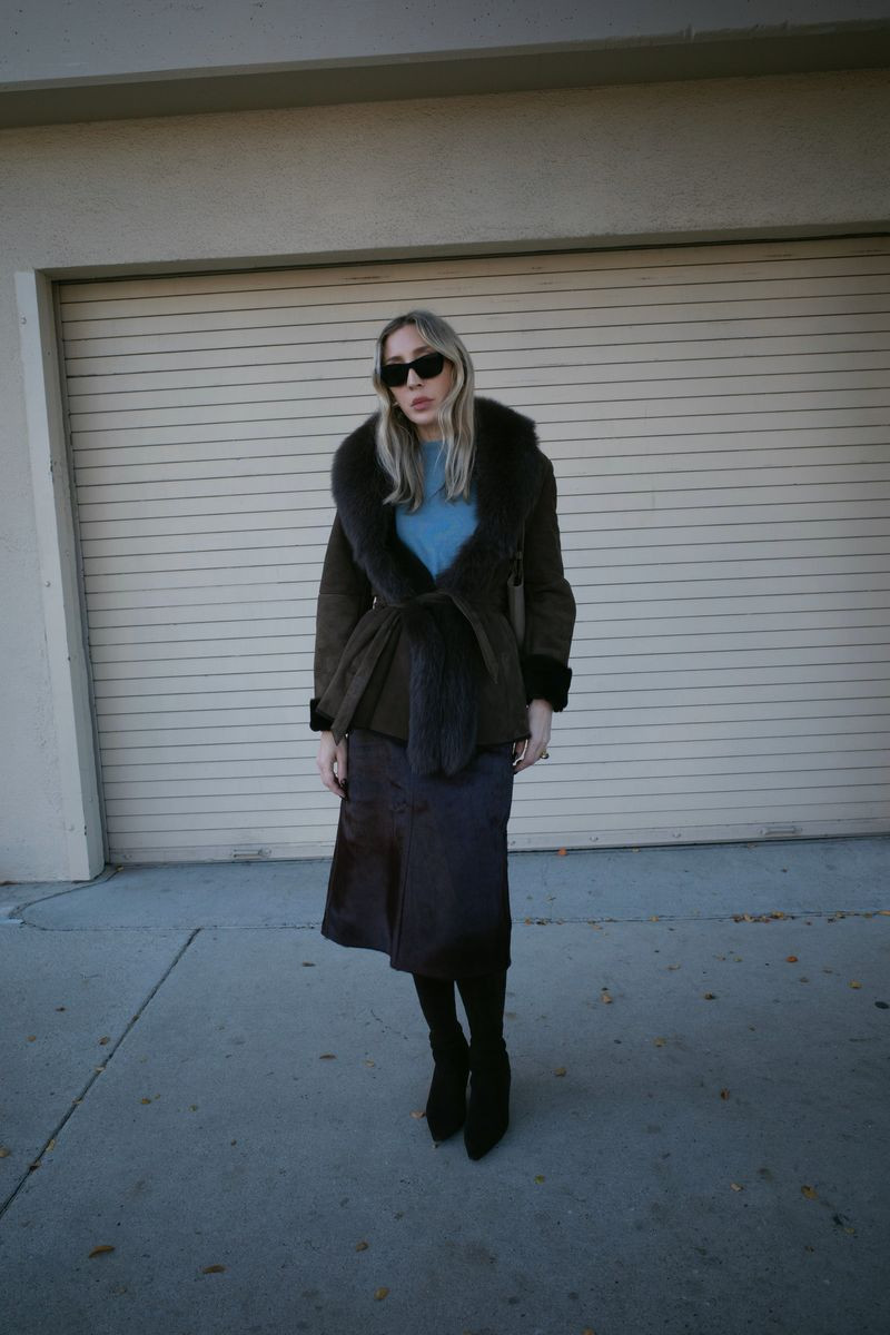 Calf hair skirt and light blue sweater #stylist #cashmere #calfhair #fur #boot 

 #LTKdayinmylife #LTKgrwm #LTKootd
