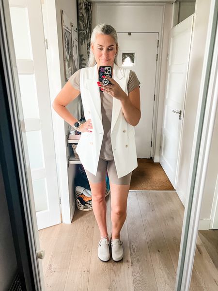 Outfits of the week

Keeping it casual for the home office in a taupe t-shirt and biker shorts set paired with a sleeveless white blazer (all last year’s H&M).

Clogs are from Sacha (current) and can’t be linked but I linked similar ones. 

#LTKstyletip #LTKeurope #LTKunder50