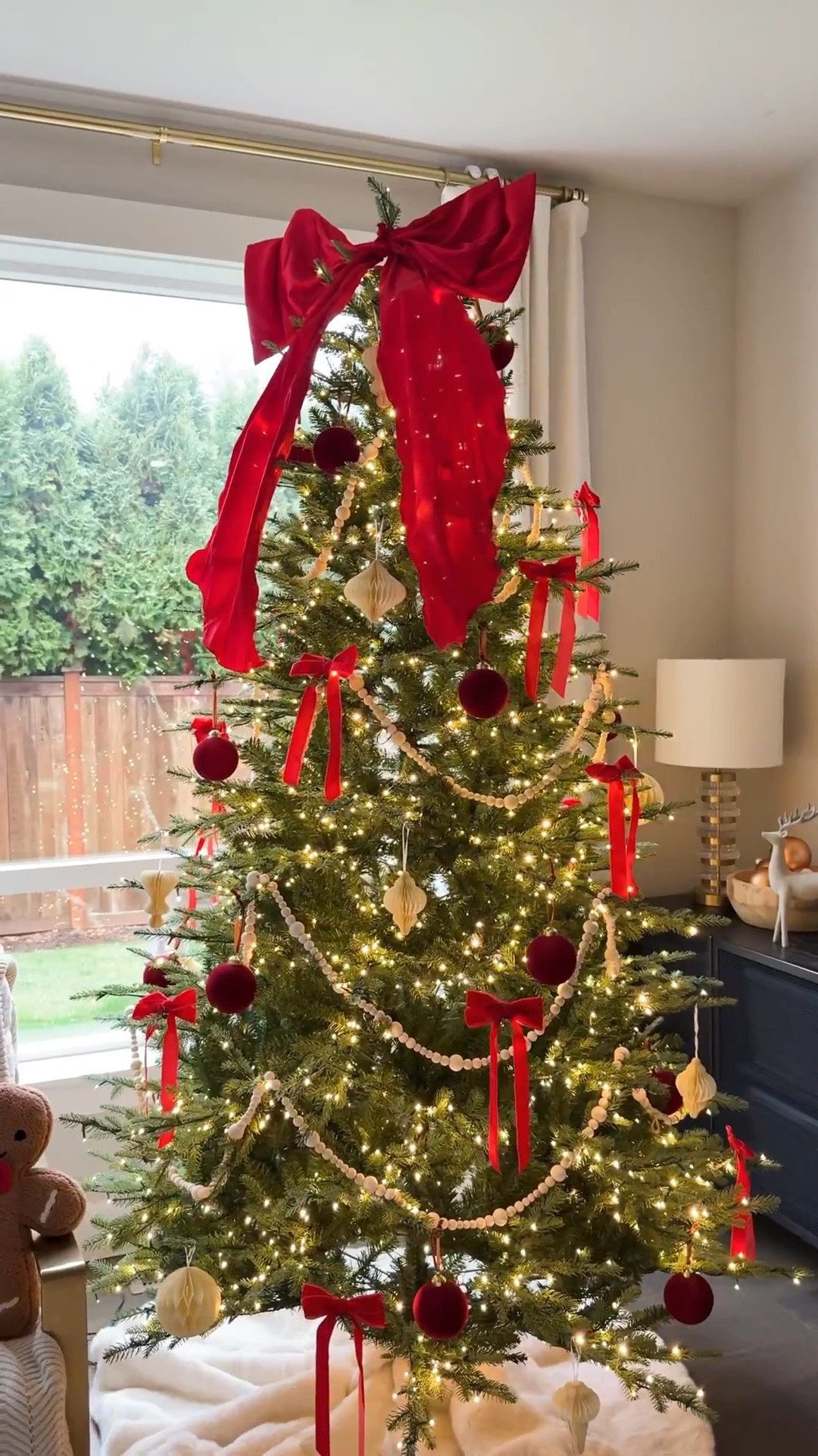 Finally decorated my tree just in time for our Friendsgiving holiday party! This is my first time doing red and green after doing pinkmas for the last 7 years 😱 Will need to add a a little more ornaments but love how this turned out so far!#christmastreedecorating #christmastreedecor

Viral Home Depot twinkling Christmas tree decorated with paper and velvet ornaments, wooden beaded garland, velvet bows, and topped with a large red satin bow from Walmart!

#LTKHome #LTKHoliday