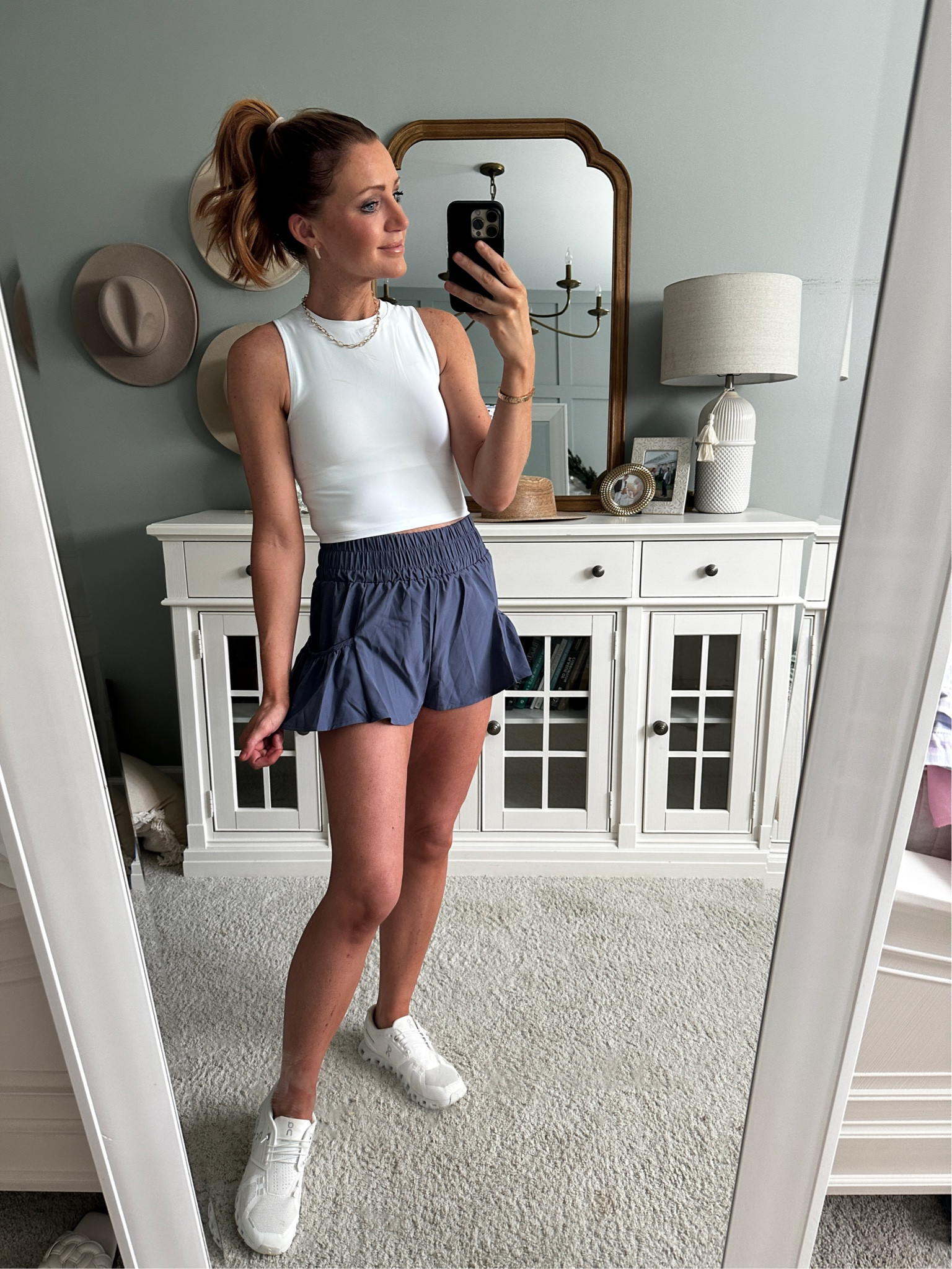 Size small in shorts. Could have sized up to medium. Size small in tank. Had built in bra with removable padding  