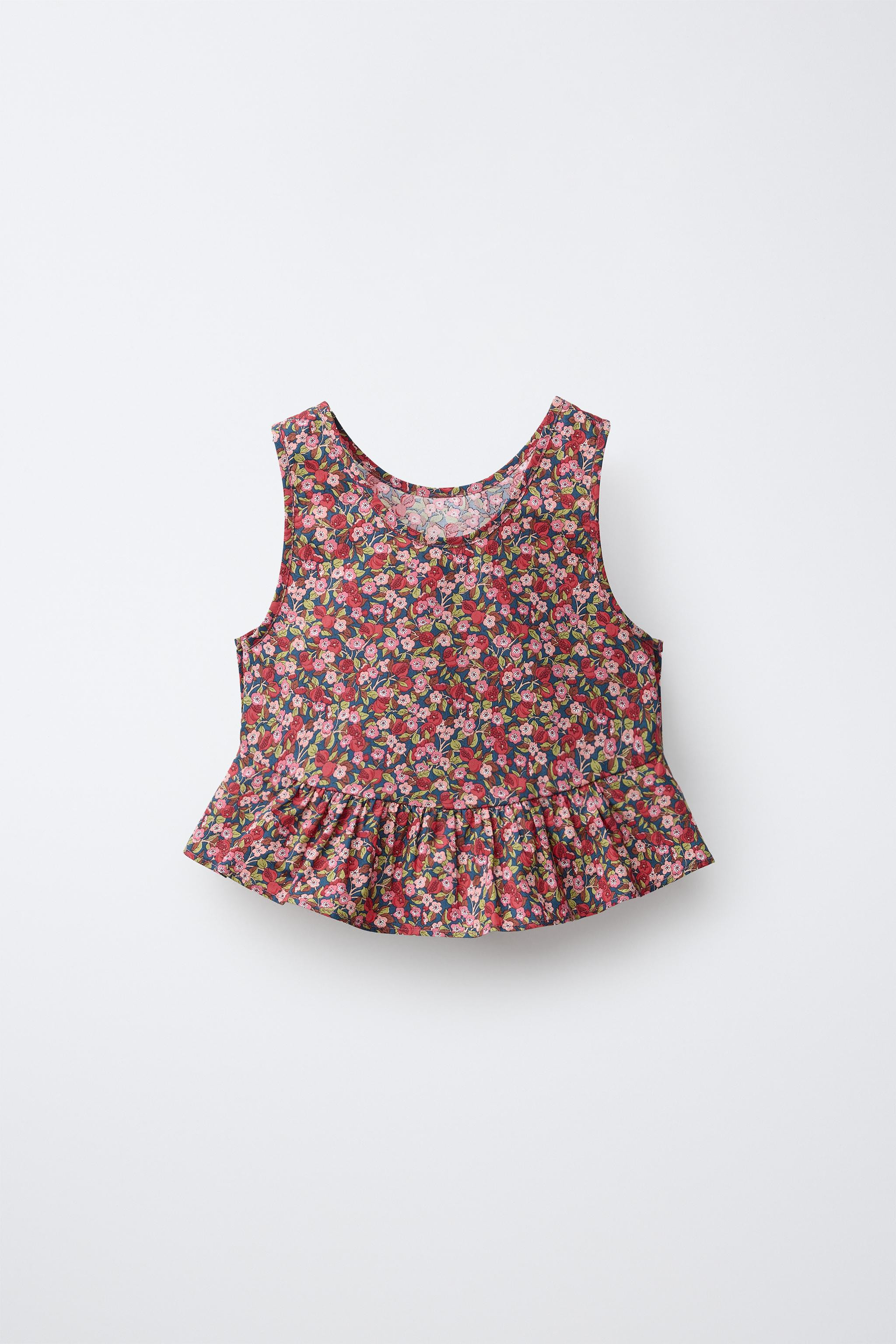 DescriptionContentsMeasurementsRound neck sleeveless top. Features a ruffled hem and floral print... | Zara US