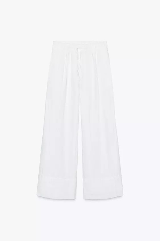 ZARA WOMAN COLLECTIONPants made of 100% linen fabric. Mid rise and elastic waistband with adjusta... | Zara US
