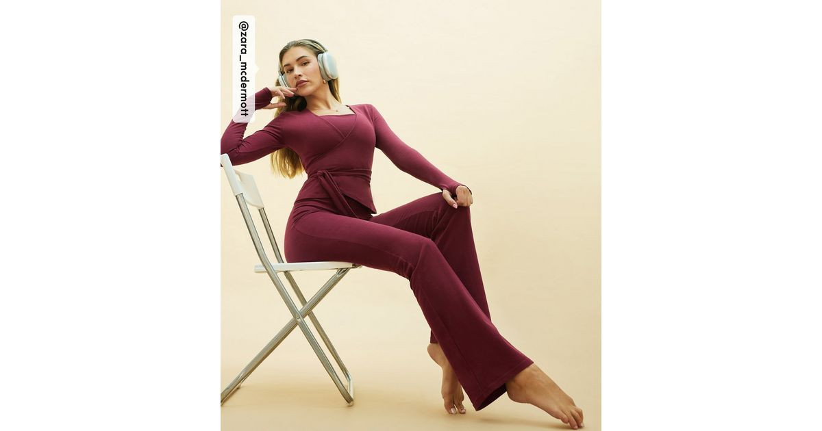 Rise by Zara McDermott Burgundy Wrap Front Ballet Top | New Look | New Look (UK)