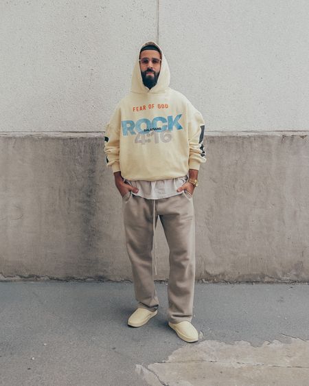 FEAR OF GOD x RRR123 Hoodie in ‘Cream’ (size 2). FEAR OF GOD Allstars Henley tee in ‘Vintage White’ (size M) and California slides in ‘Cream’. ESSENTIALS Relaxed Sweatpants in ‘Smoke’ (size M). FEAR OF GOD x BARTON PERREIRA glasses. A relaxed and elevated men’s look that’s cozy for a day out. 

#LTKstyletip #LTKmens