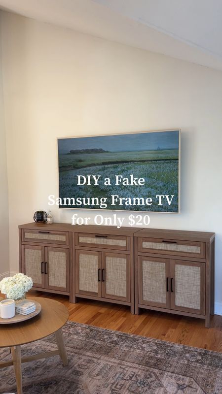 How to make a DIY Samsung Frame TV for under $20. A budget friendly option to get the frame TV look easily for your liking room or any TV in your home! Amazon DIY idea! I download the art on Etsy or find it on YouTube. Click for details and links to my TV console!

#LTKHome