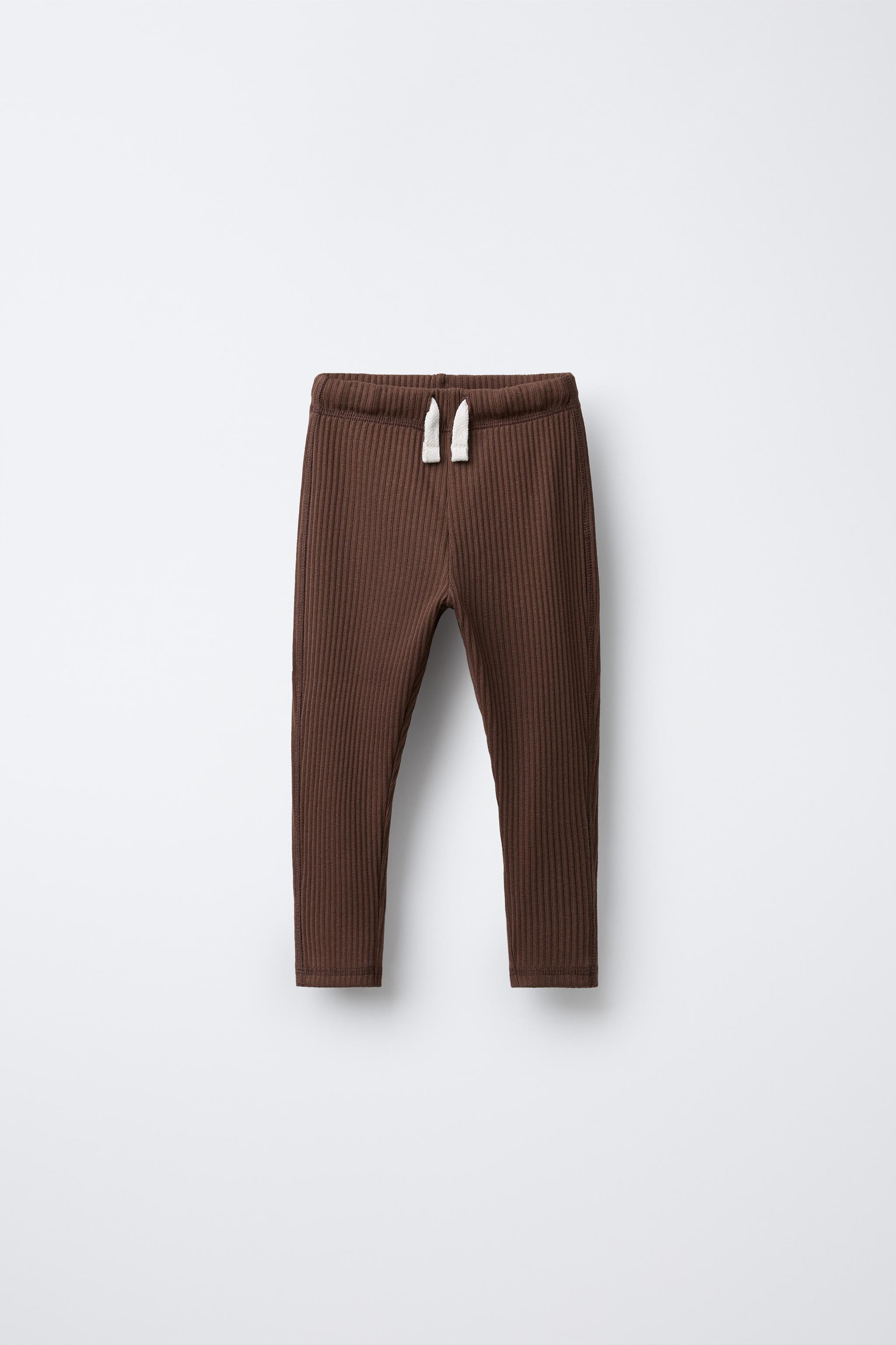 Ribbed leggings with elastic waistband and adjustable front drawstrings. Label appliqué on back. | Zara Canada