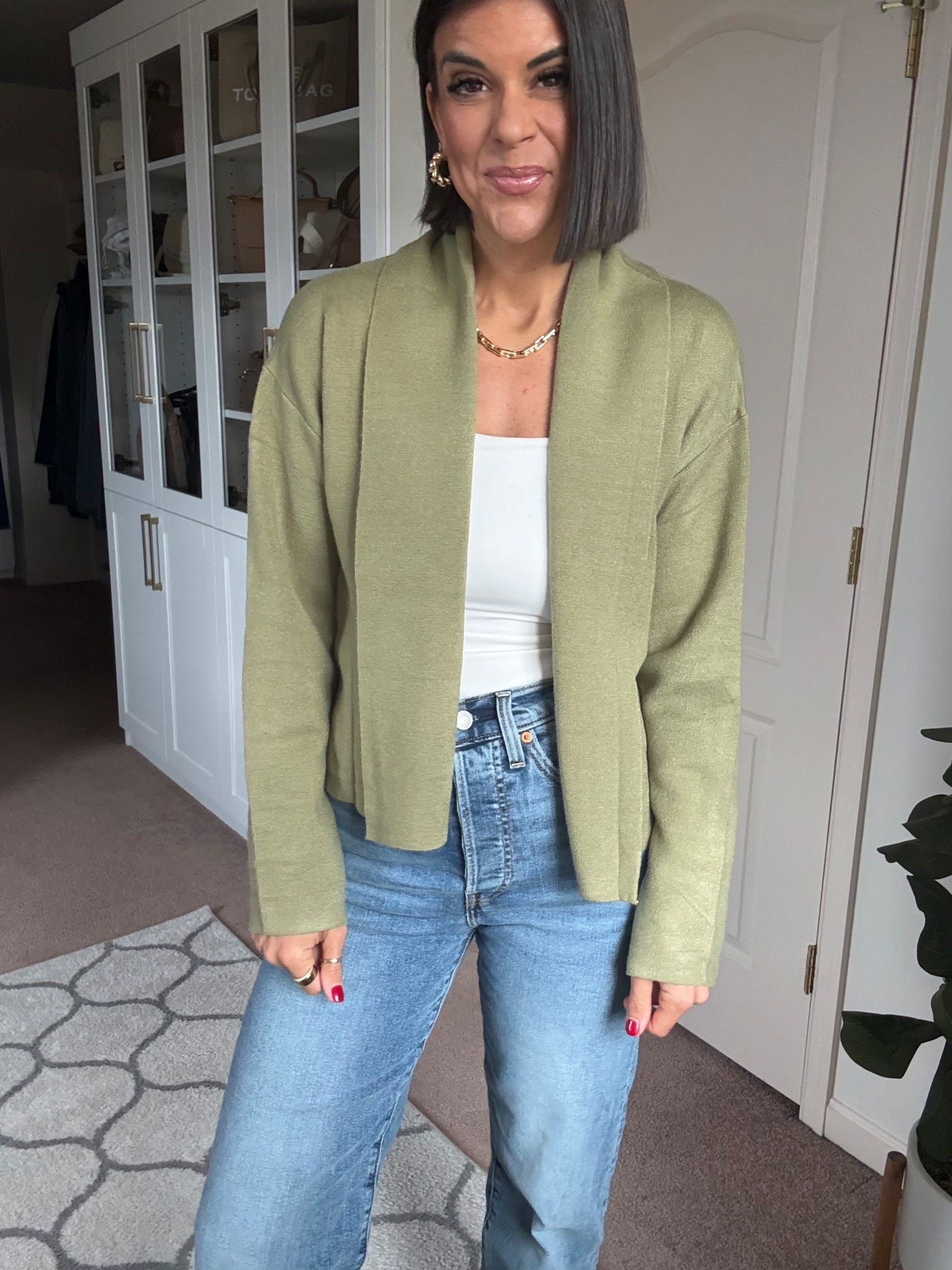 Size small in sweater and tank Size 27 in jeans

#LTKSeasonal #LTKFindsUnder100