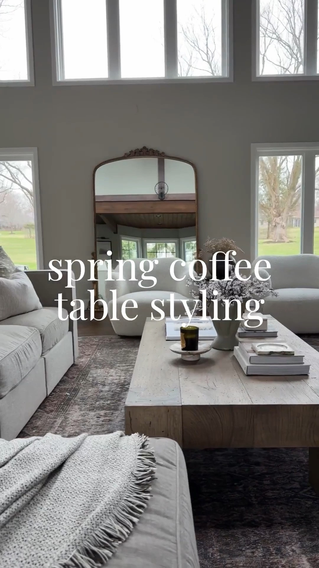 A simple yet elevated spring coffee table styling moment! You can’t go wrong with a vase and florals, a candle, and layered coffee table books! 

#LTKHome