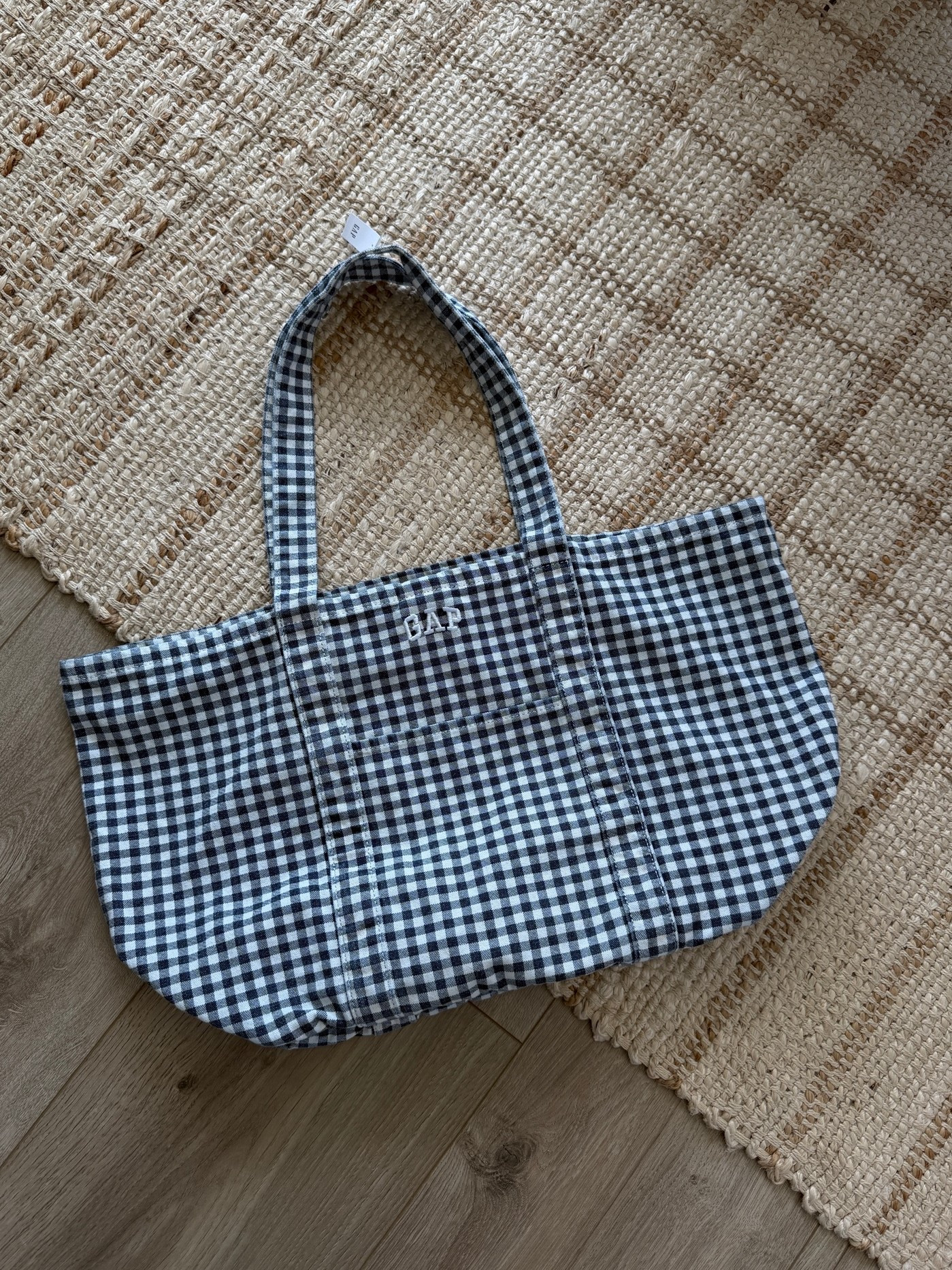 The perfect summer tote bag! Comes in a ton of colors and it is currently 40% off. ￼The gingham is out of stock but there’s a fun polka dot and stripe.

#LTKmomlife #LTKSwim #LTKTravel