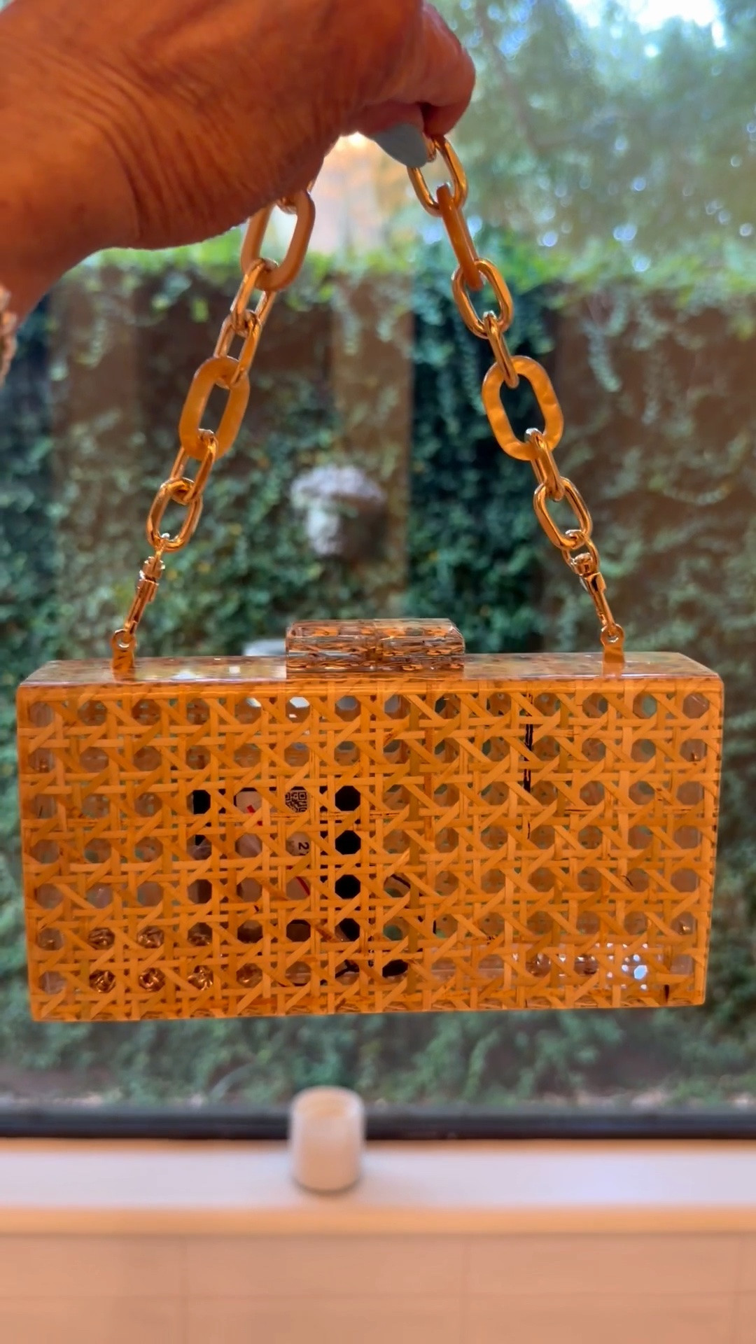 This particular bag is unavailable but I linked a similar one. -> This small rattan clutch size is about 5.9x5.9x7.7 inches. It has a suitability capacity, enough for you to put your makeup, mobile phone, keys etc. With such an organized beach tote bag , it can satisfy your beach necessities.
Box clutch, rattan and acrylic shoulder bag with removable strap.

#LTKOver40 #LTKgrwm #LTKTravel