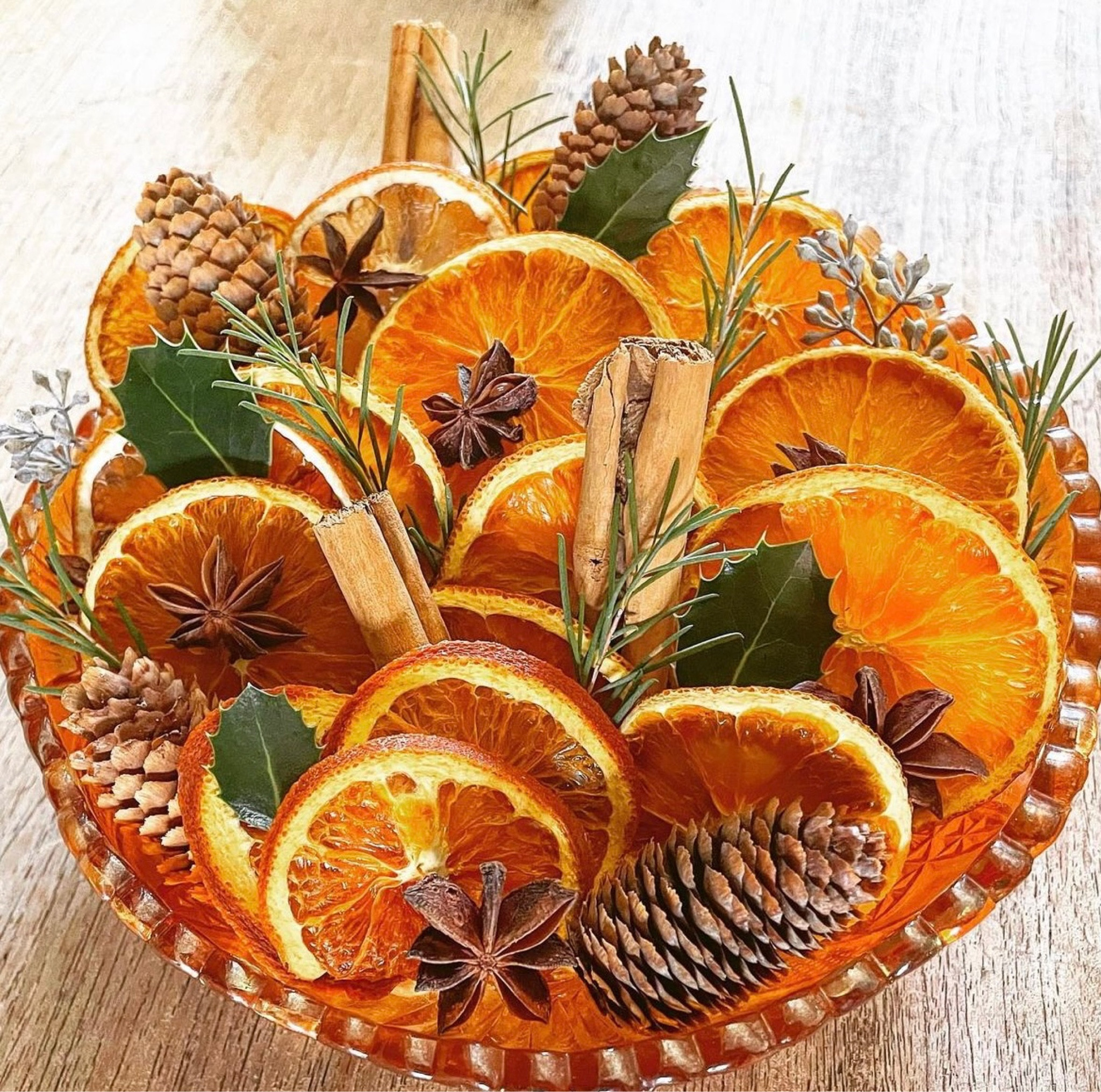 Dried Orange Christmas decorations! Perfect coffee table center piece for the holidays. Can add these to a garland or add some pine cones and cinnamon for a great holiday scent. 

#LTKHoliday #LTKSeasonal #LTKhome