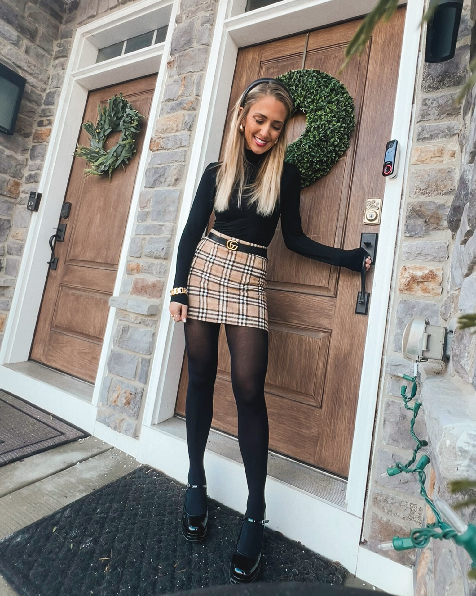 Preppy work outfit 

Mini skirt, black turtleneck, black tights, black platform heels, leather headband, Gucci belt and gold jewelry

#LTKSeasonal #LTKWorkwear #LTKStyleTip