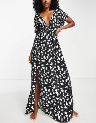 ASOS DESIGN flutter sleeve maxi beach dress in mono spot print | ASOS | ASOS (Global)