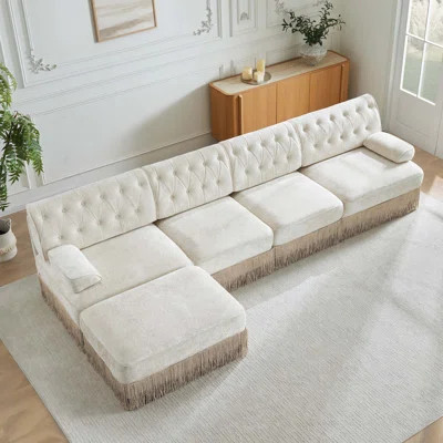 Modular Sectional Sofa With Chesterfield Button Tufting, Tassel Skirt, Upholstery, And Multi-Functional Ottoman. | Wayfair North America
