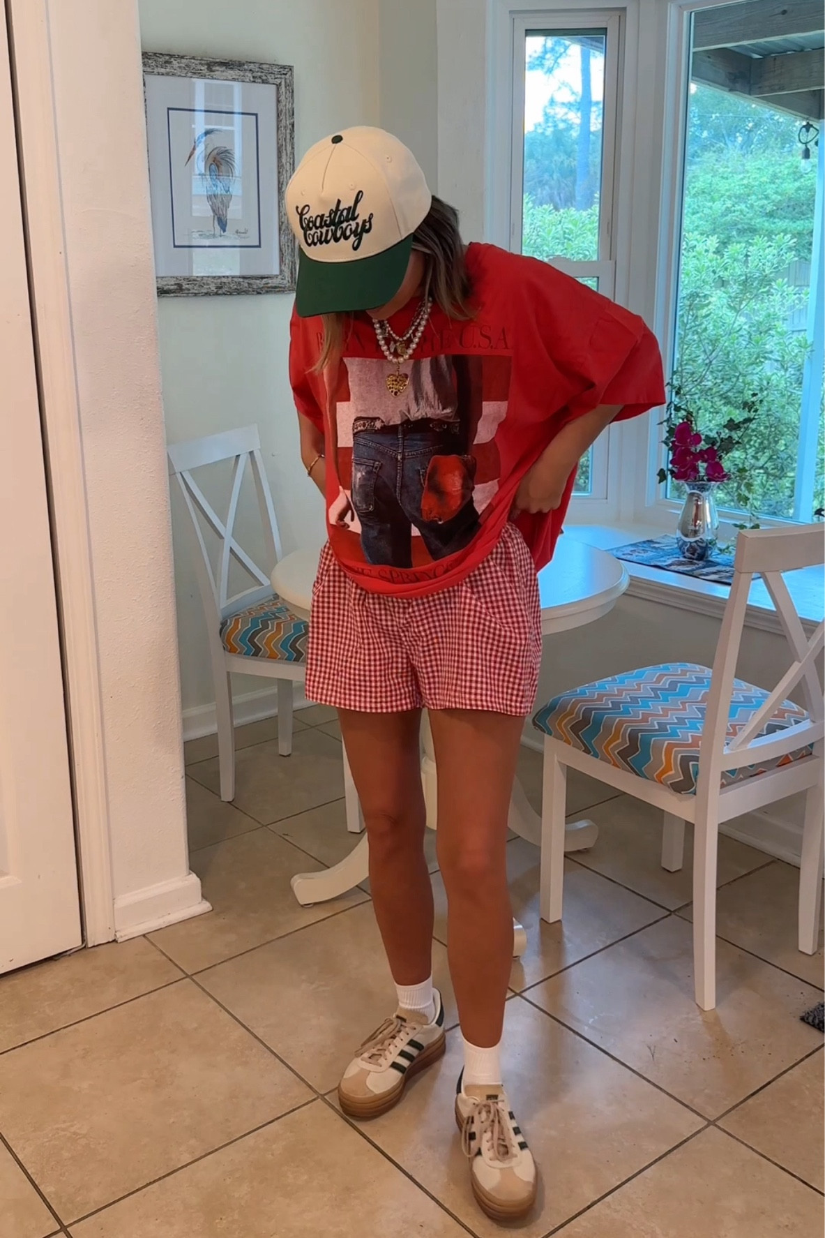 Large in the tee & medium in the shorts (size up!)