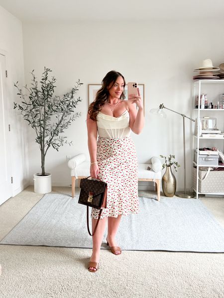 A little rose midi skirt super cute for date nights 🌹

Top wearing a small (size down)
Skirt size large (I size up for butt and hips, runs true to size)

#LTKfindsunder50 #LTKstyletip #LTKmidsize