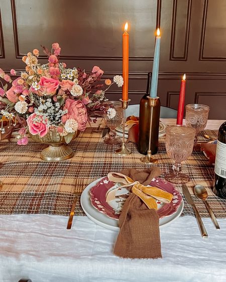 My favorite tablescape for the holidays is full of color. My plaid fall table runner is actually scarves! This Thanksgiving table decor is a mix of real and faux. Half of the candles are real, half are flameless tapered candles from lights.com. The centerpiece is made from dried stems, faux stems, and flowers from Trader Joe's.

#tablescape

#LTKHoliday #LTKSeasonal #LTKhome