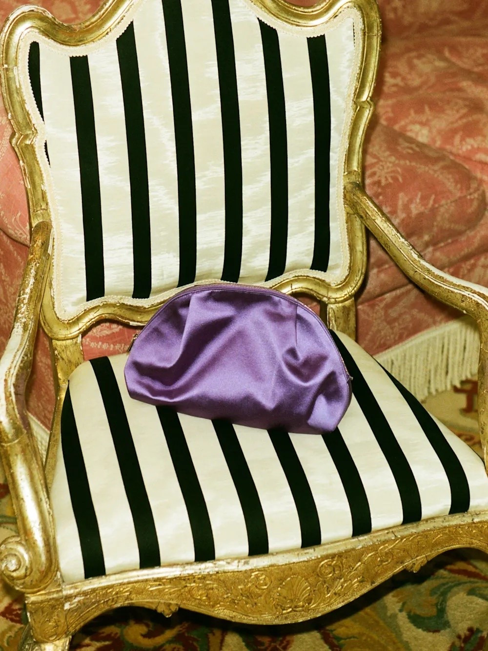 Courtney Grow’s collab clutch! How fab is this purple! @reformation #ad