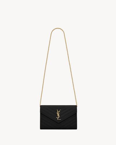 wallet  made with metal-free tanned leather with flap decorated with metal YSL initials, quilted ... | Saint Laurent Inc. (Global)