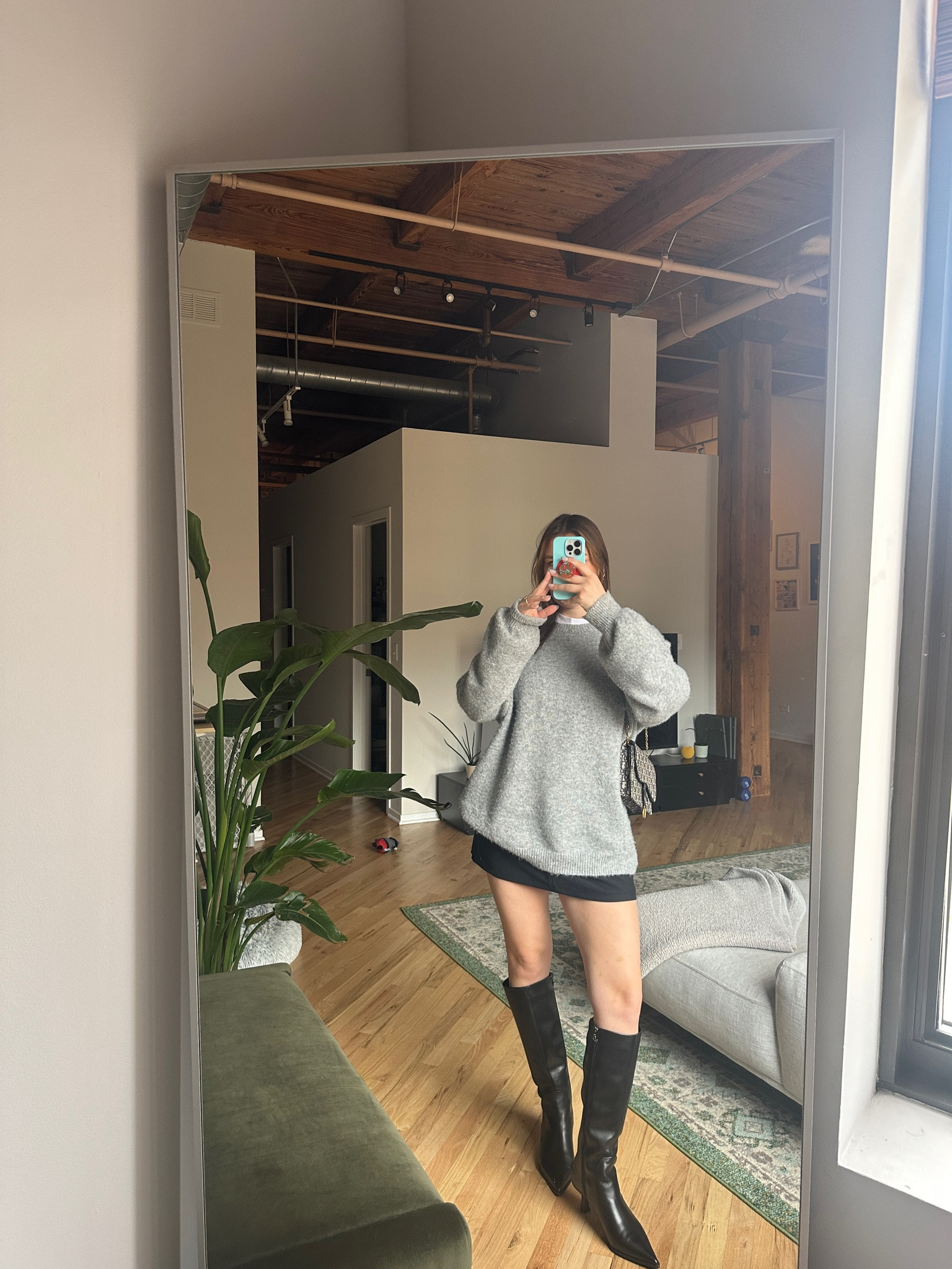 Obsessed with this oversized grey sweater, black mini pleated skort, and black knee high boots with a kitten heel for the fall!!! Such an easy throw together outfit!

#LTKSeasonal #LTKShoeCrush #LTKFindsUnder100