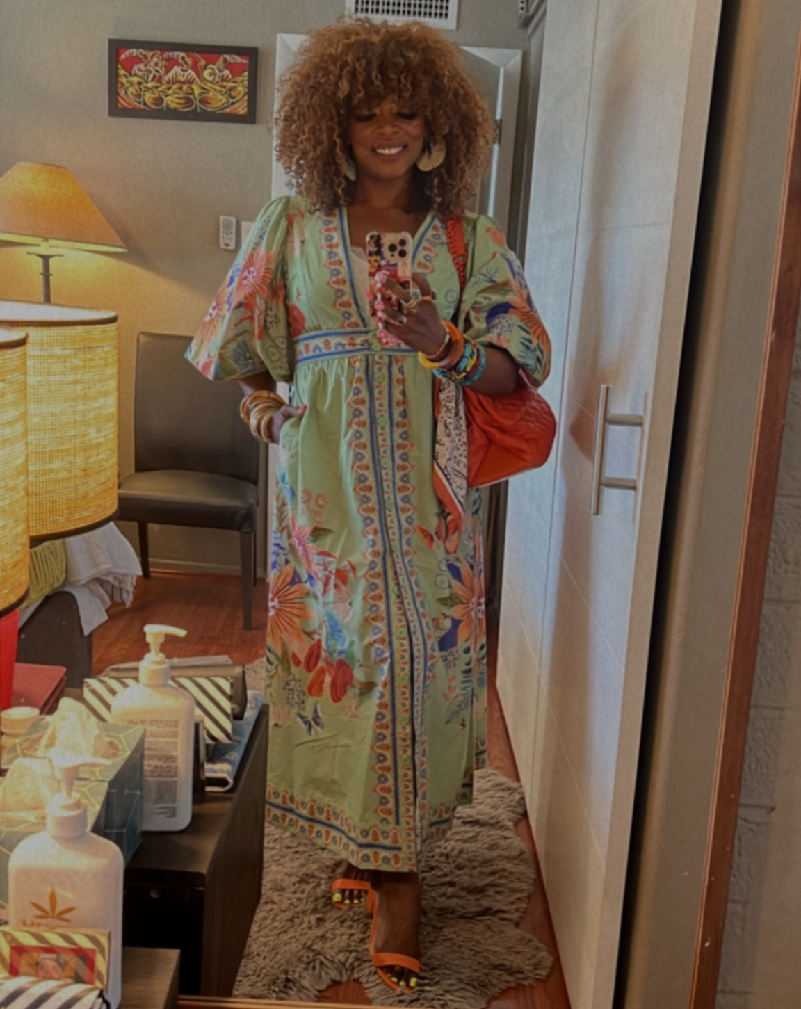 Podcast Taping Look but also all the events things look! This outfit is so fun to play with as due to the low deep V you can wear it with nipple covers or a cami. I’ve paired it with a burnt orange cami as well as an ice blue one! Pops of orange followed to elevate the floral print in the fabric & lots of accessories & were out the door!

#LTKSeasonal #LTKwedding #LTKFestival