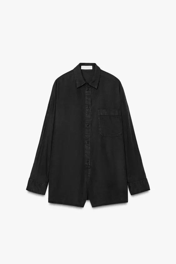 Short jumpsuit made of flowy fabric. Lapel collar and long sleeves with cuffs. Patch pocket on ch... | Zara US