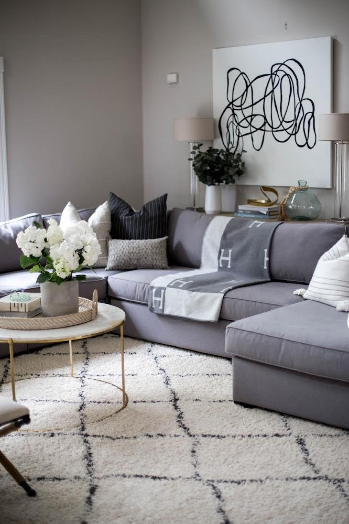 Our #familyroom rug is 50% OFF today! Love it so much we also have it in our basement. Three years, 3 kids and still going strong 💪🏻 #familyroomrugs #livingroomrugs #neutralrugs 

#LTKsalealert #LTKhome #LTKSale