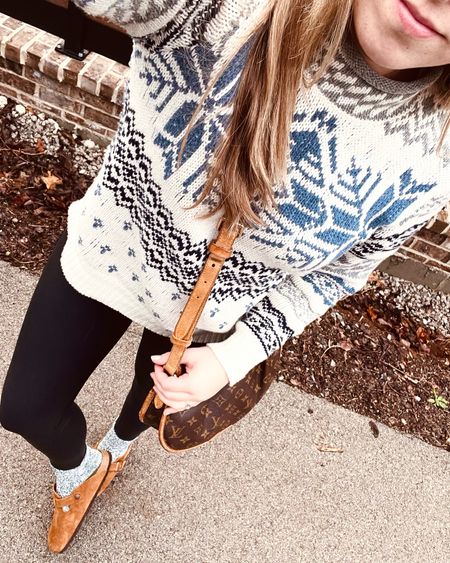 Comfy cozy post-holiday travel outfit in this soft snowflake fair isle sweater & faux leather leggings and Birkenstock clogs!

#LTKtravel #LTKSeasonal #LTKstyletip