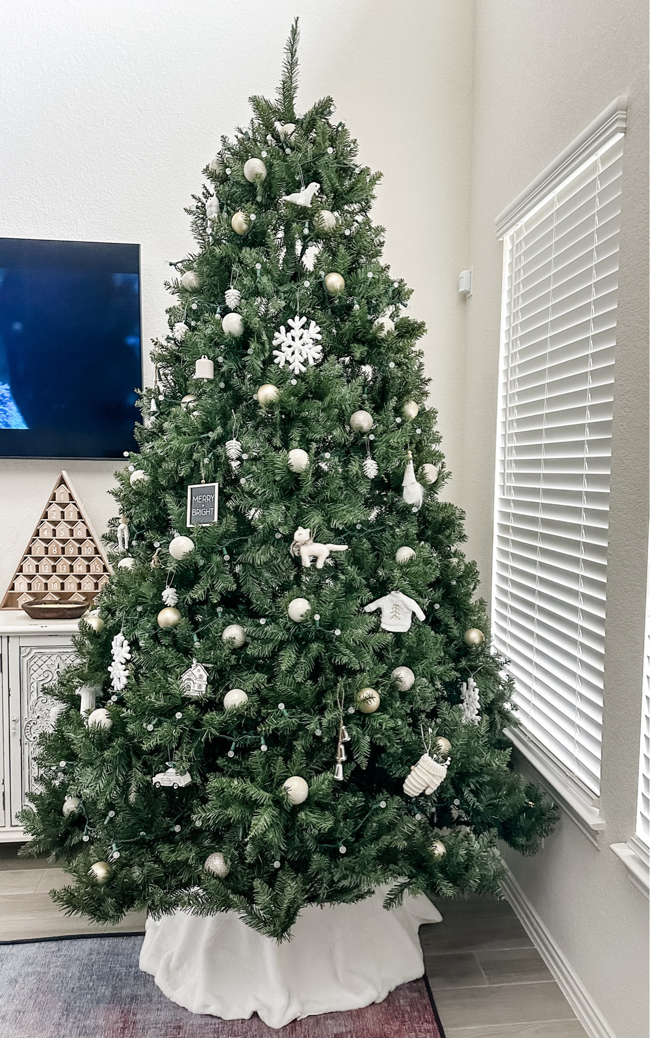 Christmas Tree + Ornaments! Went with white & champagne colors this year. Obsessed with this 9ft tree! Best price I’ve seen. #christmas #ornaments #christmastree #holiday 

#LTKHoliday #LTKhome #LTKSeasonal