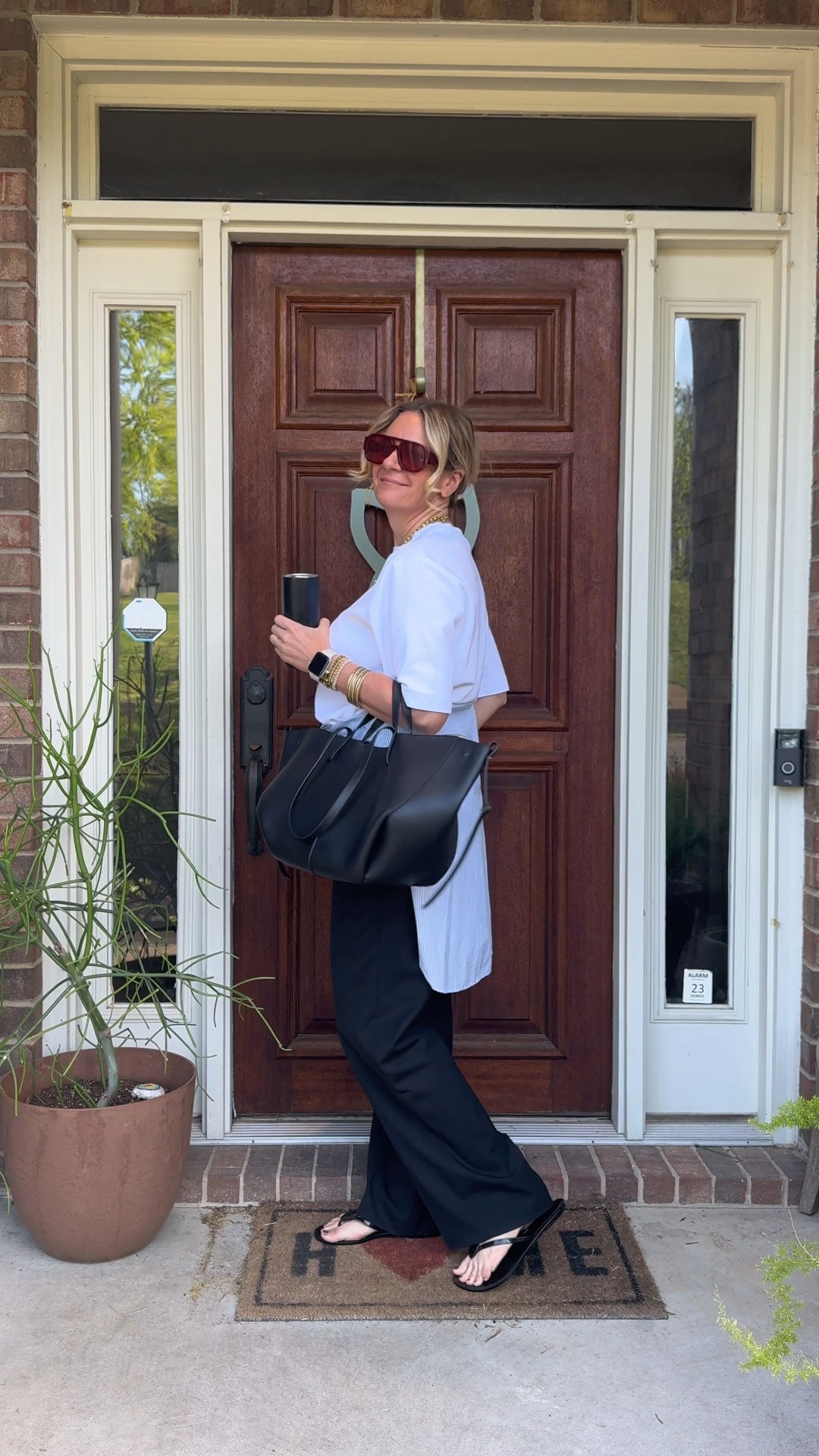 OOTD for an easy weekend ✨ Oversized white tee + black trousers + a shirt tied at the waist + black jelly flip flops. All from my own closet — linked the closest versions I could find. Everything shoppable below! 👇

#LTKdayinmylife #LTKootd #LTKOver40