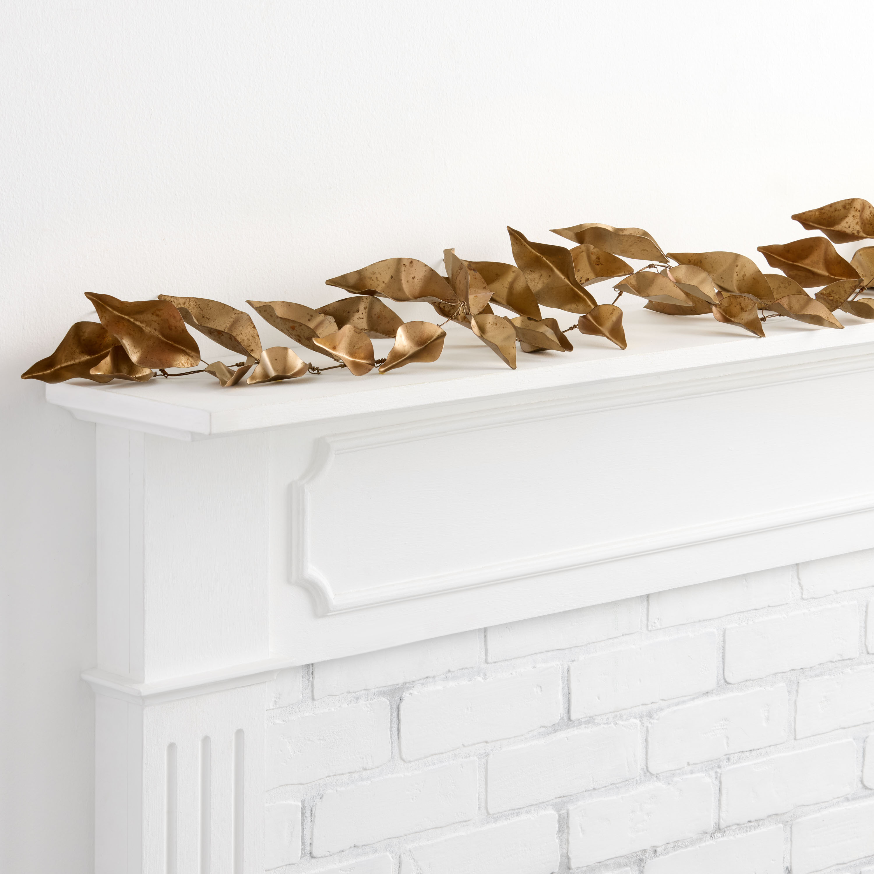 Antiqued Gold Metal Magnolia Leaf Garland | World Market