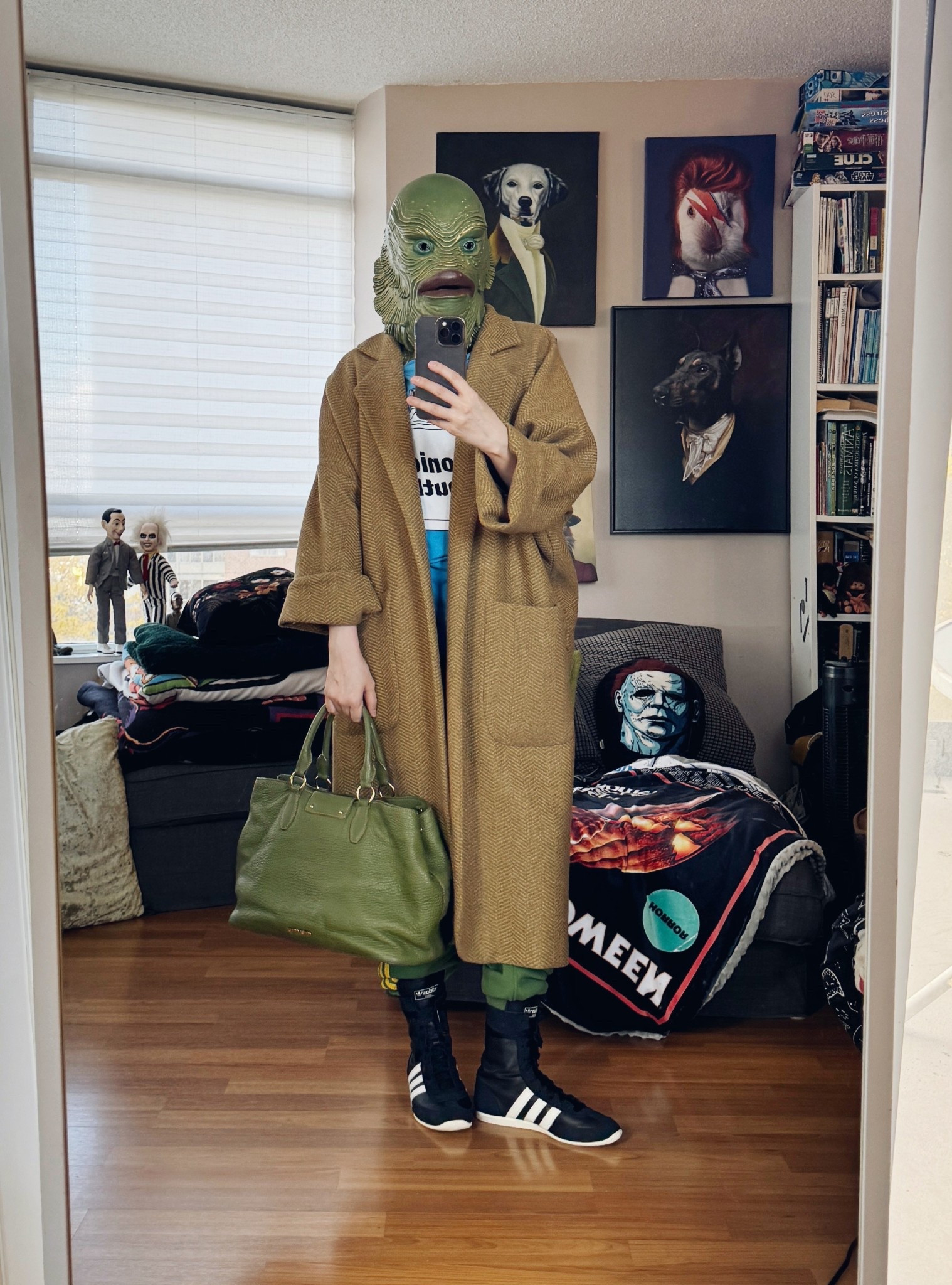 Happy Halloween! The Creature From the Black Lagoon is my husbands newest mask acquisition. Which is fitting because I often feel like I’ve just crawled out of a swamp. She screams Sonic Youth fan to me, so I went with that vibe, bringing out my @horsesatelier alchemical coat for the first time this season since it really complements the green.
I was also going to update the mask reel but I’m too lazy. 

Tee, bag, track pants are secondhand/vintage. 

#LTKOver40 #LTKStyleTip #LTKHalloween