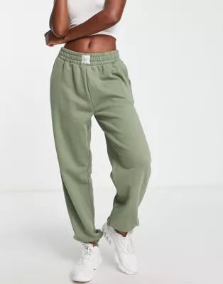 Chelsea Peers high rise sweatpants with woven logo tab in sage | ASOS (Global)