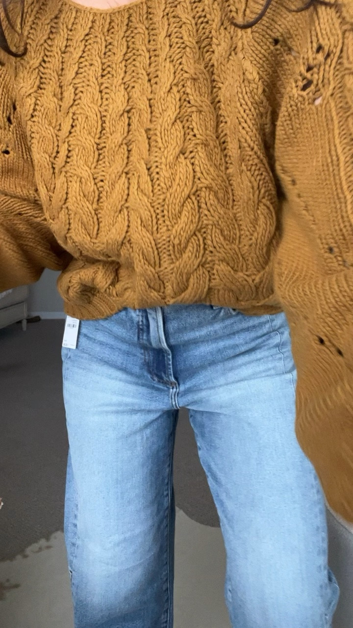 NSALE. Free People sweater and jeans. Wearing a small