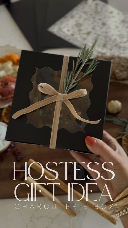 Here’s a super easy & cute gift idea! This would be great for a host/hostess, neighbors, coworkers, church family, you name it! I opted to leave off a gift tag but you could absolutely add a cute one in the middle! And you don’t have to use Rosemary, use any seasonal greenery you have (even faux will work)! 

These tissue paper sheets are so pretty! Love the white and gold and they fit PERFECTLY inside the boxes! Already come pre-cut so it’s super easy and efficient if you need to make lots of boxes! 
Also, if you want to make things go a little quicker you can buy small protein packs and use the already cut cheeses and trail mixes 🥰.   

These are the ingredients I used but you can use whatever!! Make it yours!
-salami
-small thick pepperoni
-mixed nuts
-chocolate covered almonds
-cubed cheddar cheese
-sharp cheddar squares
-cubed Monterey Jack cheese
-dried apricots
-dried figs
-green olives
-roasted red pepper hummus
-Italian breadsticks
-fig & rosemary crackers
-grapes 

Hope this helps provide you with some inspiration for giving this Christmas season! 🥰🥰🥰

#charcuteriebox #giftidea #christmas #holiday #ltkhome #hostessgift #charcuterie

#LTKGiftGuide #LTKHoliday #LTKVideo
