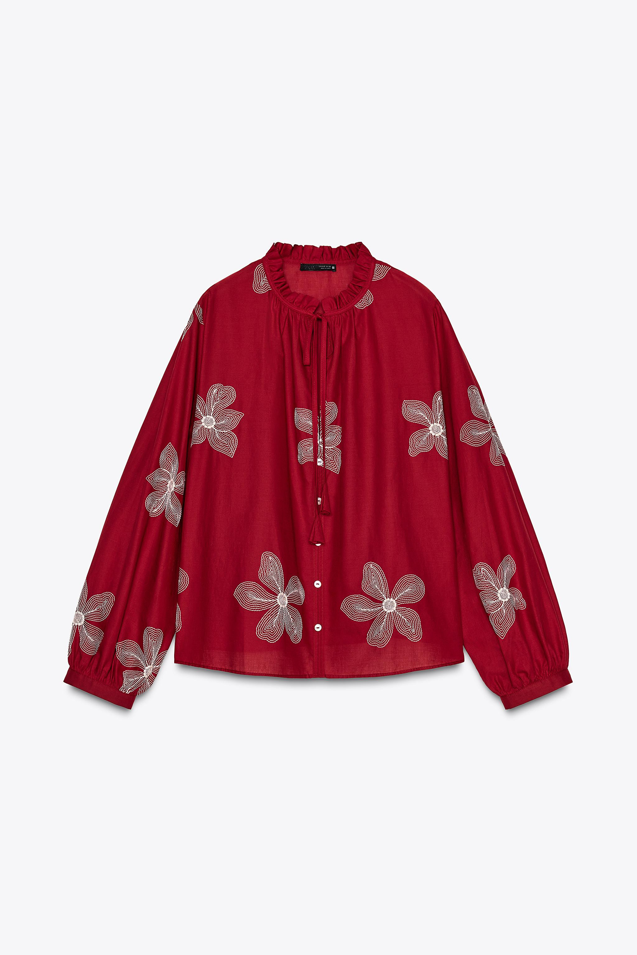 Round neck blouse with ruffle and drawstring. V-neck and long sleeves. Contrasting floral embroid... | Zara US